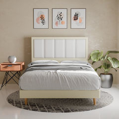 Modern bedroom with wooden bed frame and houseplant.