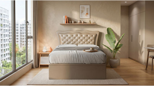 Beige tufted bed frame in a modern Singapore condo studio bedroom with city view, built-in wardrobe, indoor plant, and space-saving layout