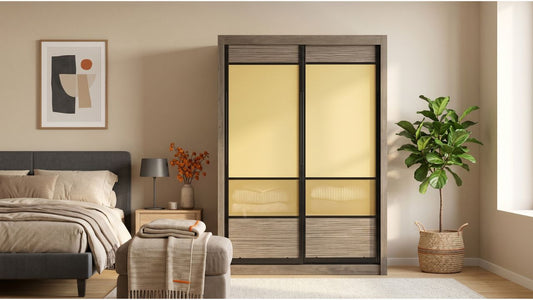 Compact grey sliding wardrobe with yellow glass panels in a modern Singapore bedroom with neutral decor