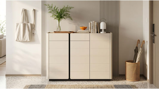 Cream shoe cabinet with drawers in a modern Singapore foyer with mirror, bench, and entryway shoes