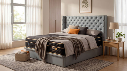 Premium hotel-grade mattress with blue tufted bed frame in a modern Singapore bedroom, styled for comfortable home sleep