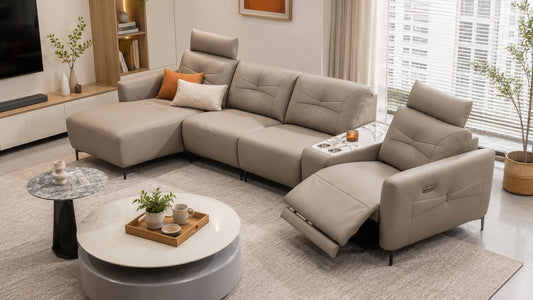 MaxiHome sofa bed with mattress upgrades in a warm modern Singapore living room with neutral tones and practical layout.