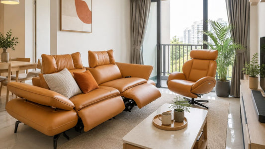 Caramel leather recliner sofa and matching recliner chair in a modern Singapore living room with warm neutral styling