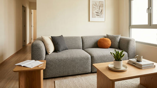 Modular grey sofa in a compact Singapore walk-up apartment living room, showing practical furniture fit, clear walkway space, and delivery-friendly proportions.