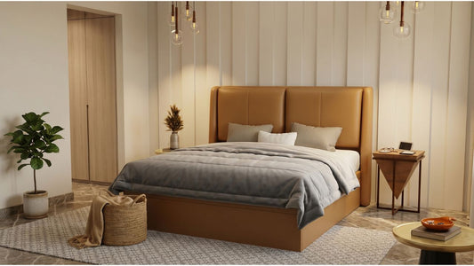 Tan upholstered bed frame with grey bedding in a modern Singapore HDB bedroom with wardrobe storage