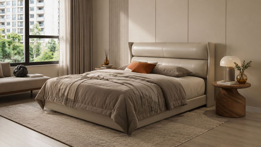 Taupe upholstered bed frame with tall cushioned headboard in a modern Singapore bedroom with soft daylight and neutral styling.