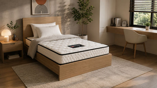 Sommuz Pride Tencel cover mattress on a light wood bed frame in a modern minimalist Singapore bedroom with warm natural lighting