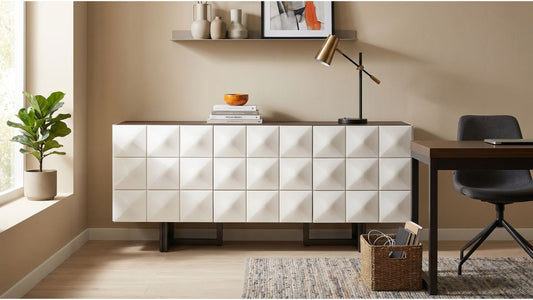 White office storage console with task lamp beside a wooden desk in a warm Singapore home office