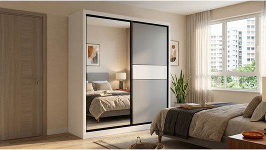 White sliding wardrobe with mirror and frosted panels in a modern Singapore HDB bedroom with warm neutral decor
