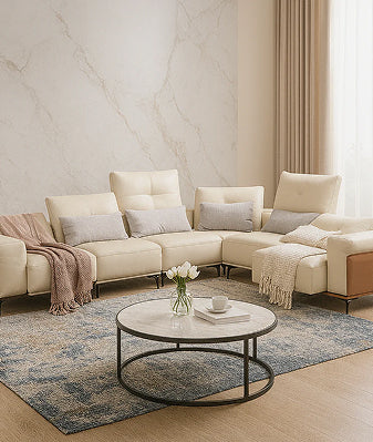 Brown couch with throw pillow and coffee table.
